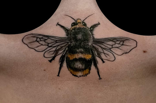 Explore hand tattoo ideas for men, creative tattoo ideas in Denison, available at Calypso Tattoo