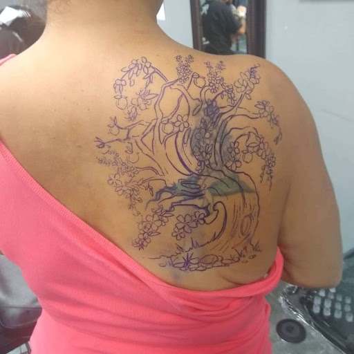 Explore dragon head tattoo ideas, creative tattoo ideas in Phoenix, available at Grand Avenue Tattoo & Piercings