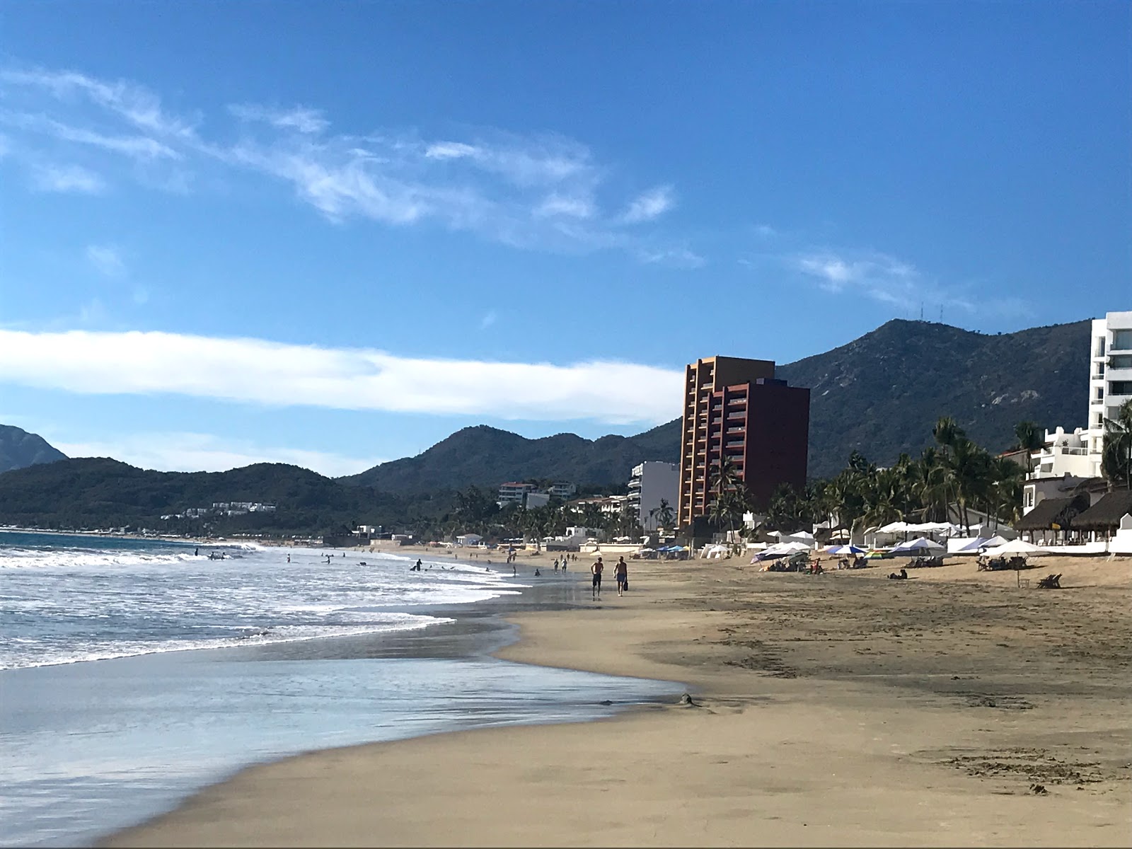 Foto av Playa Olas Altas med lång rak strand