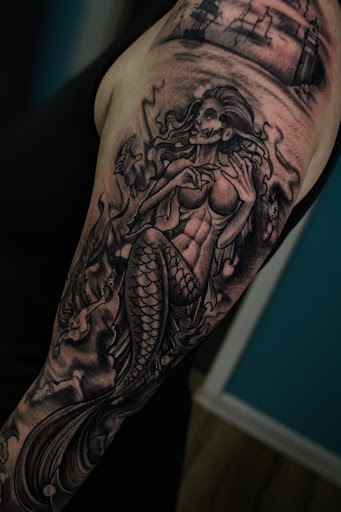 Explore sleeve tattoo filler ideas, creative tattoo ideas in Homosassa, available at Citrus Tattoos