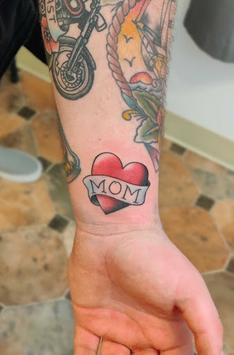 Explore small bum tattoo ideas for females, creative tattoo ideas in Hebron, available at Explosive Ink Tattoo