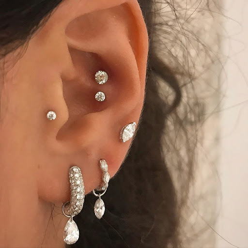 Explore loon tattoo ideas, creative tattoo ideas in New York, available at MARIA TASH Fine Jewelry & Luxury Piercing