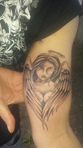 Explore venom tattoo ideas, creative tattoo ideas in Laurel, available at Outlaw Tattoo