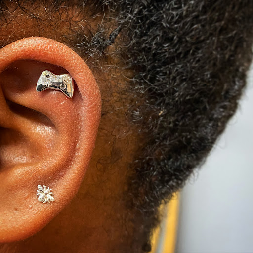 Explore easy flower tattoo ideas, creative tattoo ideas in Cary, available at Fine Art Body Piercing By Lilith Mae