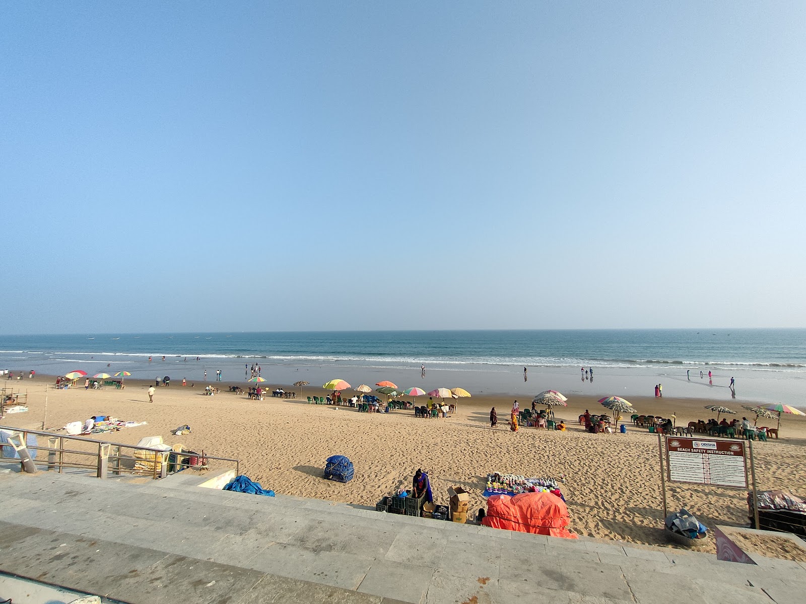 Foto de Gopalpur Beach con arena fina beige superficie