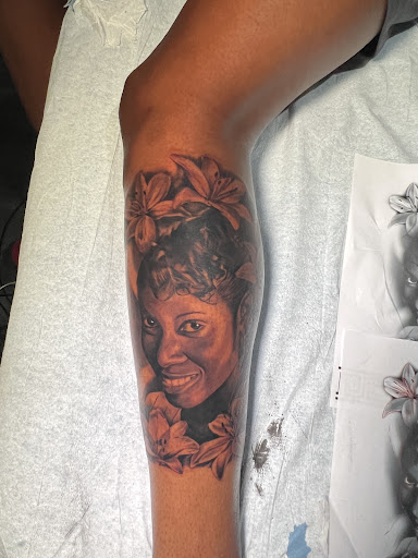 Explore banner tattoo ideas, creative tattoo ideas in Atlanta, available at Golden Anchor Tattoo