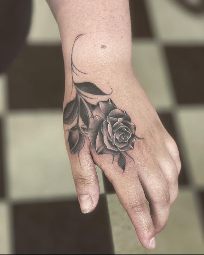 Find tattoo ideas of roses for your next unique tattoo in Stevens Point at Black Rabbit Tattooing
