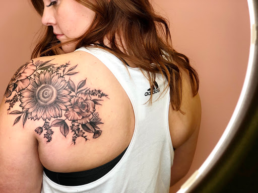 Explore peacock feather tattoo ideas, creative tattoo ideas in Batavia, available at The Pretty Pin-Up Tattoo Parlor