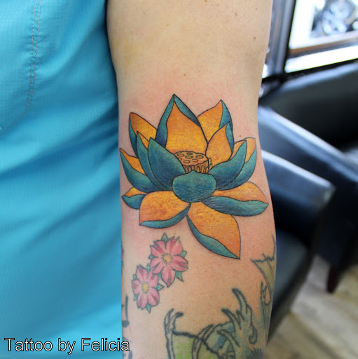 Explore barb wire tattoo ideas, creative tattoo ideas in Fort Myers, available at Tiger Lotus Tattoo and Piercing