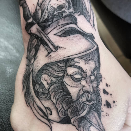 Explore ankle foot tattoo ideas, creative tattoo ideas in Centerton, available at Traditions Tattoo Company