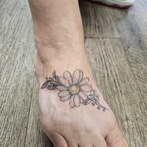 Explore rising sun tattoo ideas, creative tattoo ideas in Traverse City, available at Pinups & Needles