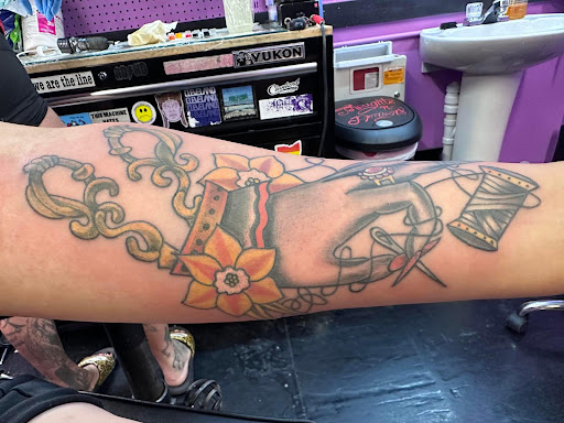 Explore tattoo ideas on tricep, creative tattoo ideas in Barberton, available at Magic City Tattoo Company