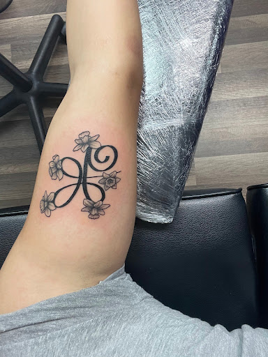 Explore lupus tattoo ideas, creative tattoo ideas in Jackson, available at Branded By Brittany Ink