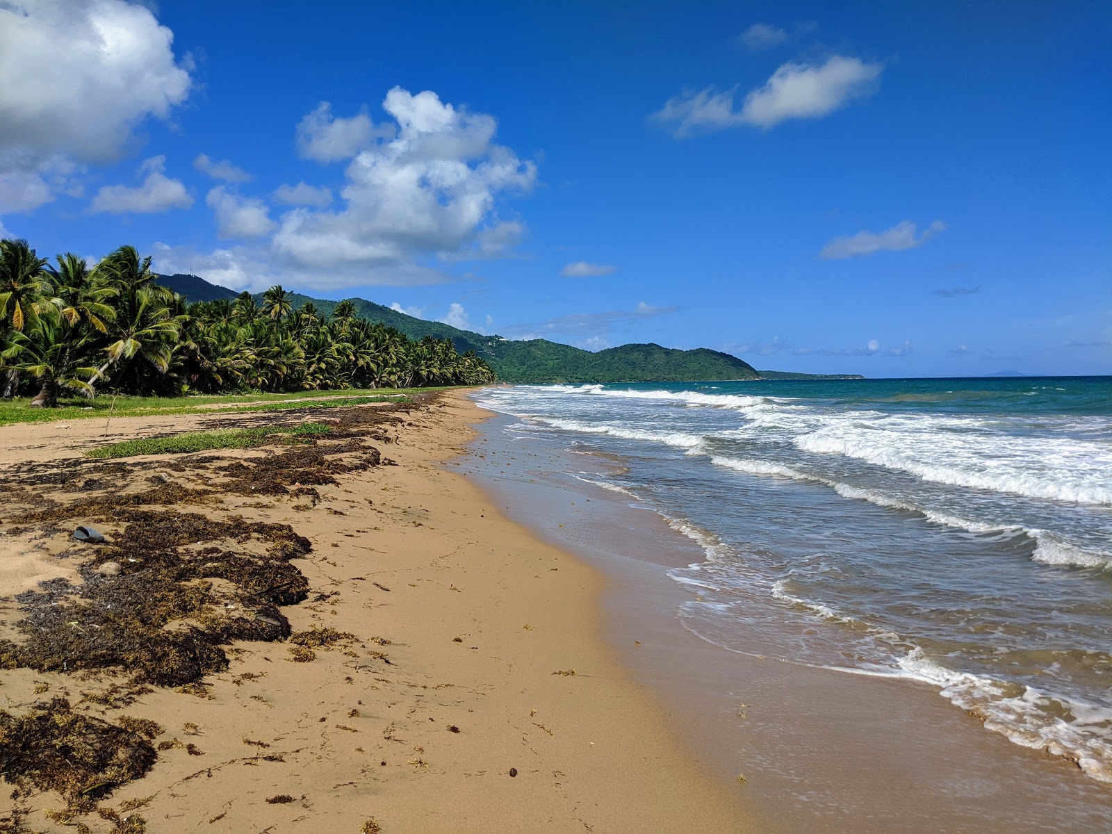 Foto de Playa Punta Tuna con arena fina beige superficie