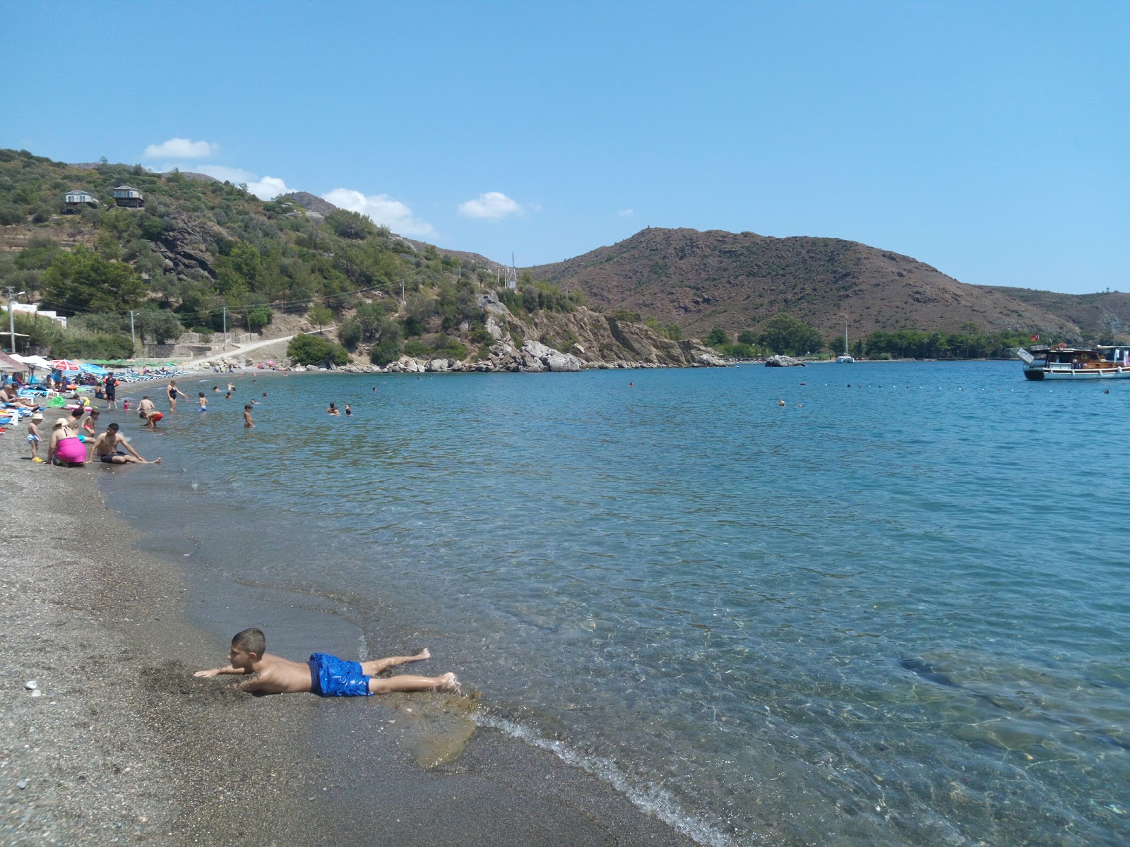 Foto von Hayitbuku Bay beach und seine wunderschöne Landschaft
