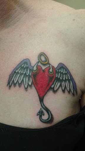 Explore leg tribal tattoo ideas, creative tattoo ideas in Valley Park, available at Full Spectrum Tattoo