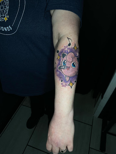 Explore boo tattoo ideas, creative tattoo ideas in Cadillac, available at Limitless Ink Tattoo Studio