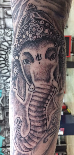 Explore negative space tattoo ideas, creative tattoo ideas in New Orleans, available at Mid City Voodoux Tattoos