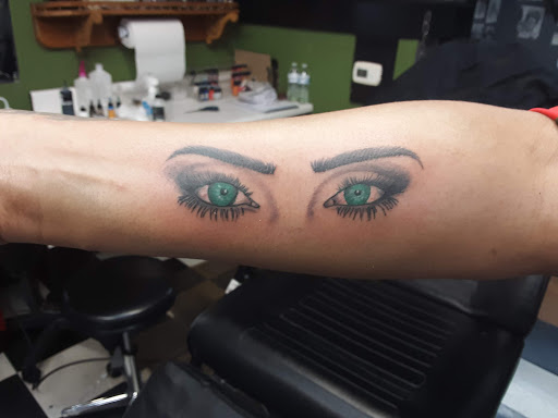 Tattoo Shop «Art In Motion Inc Tattooing», reviews and photos, 415 S Broadway St, Medina, OH 44256, USA