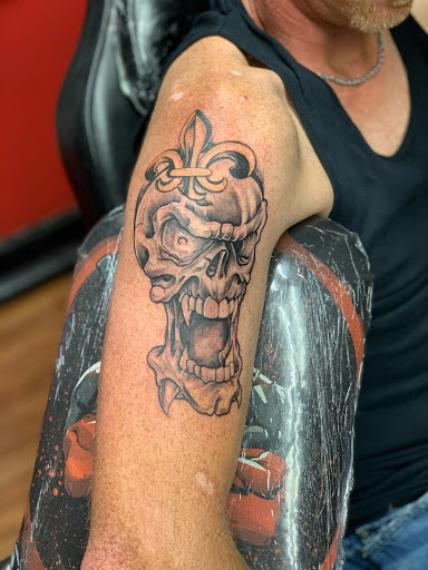 Explore dark humor tattoo ideas, creative tattoo ideas in Boaz, available at Skin Deep Tattoo & Piercing Studio