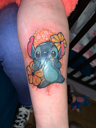 Find tattoo ideas for in between breast for your next unique tattoo in Bainbridge at Bainbridge Tattoo Company
