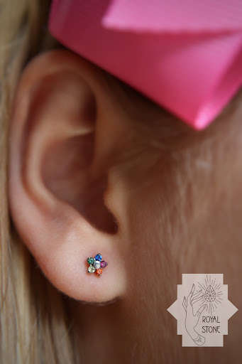 Explore tattoos for behind the ear ideas, creative tattoo ideas in Mobile, available at Royal Stone Piercing