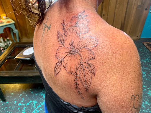 Explore tattoo ideas leg, creative tattoo ideas in Russellville, available at All Is Well Tattoo and Art Studio