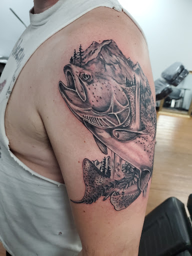 Explore dexter tattoo ideas, creative tattoo ideas in Rogers, available at Saved by Grace Tattoo Studio