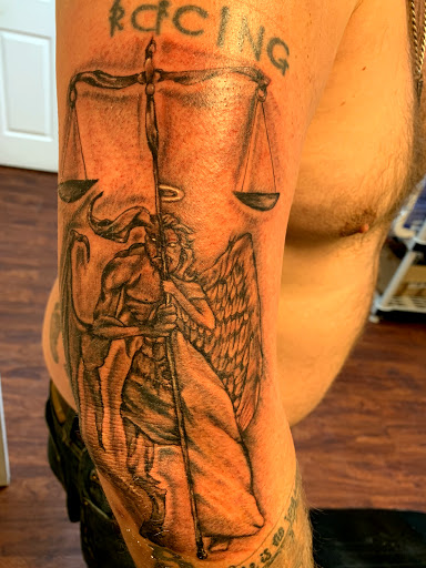 Explore omerta tattoo ideas, creative tattoo ideas in Seymour, available at American Gypsy Tattoo Corp.