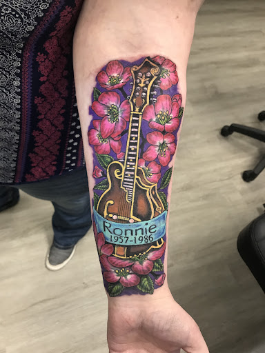 Explore singer tattoo ideas, creative tattoo ideas in Taylor, available at Solid Tattoo LLC