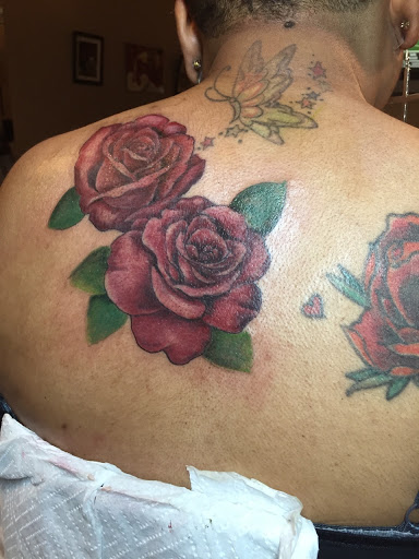 Explore color tattoo cover up ideas, creative tattoo ideas in Atlanta, available at Camp Creek Body Art & Laser