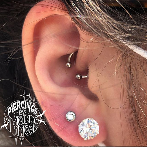 Explore paint tattoo ideas, creative tattoo ideas in Oshkosh, available at Piercings by Molly Moon at 920 Tattoo and Piercing