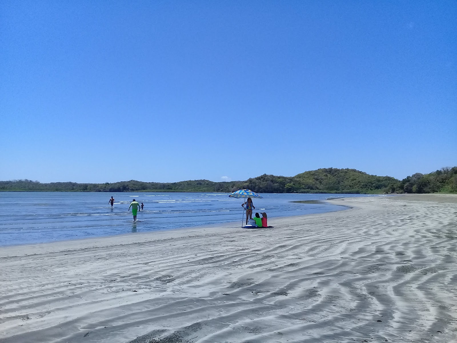 Fotografija Playa Hermosa z svetel pesek površino