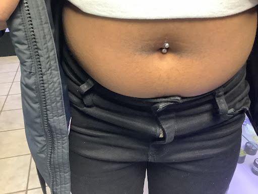 Explore wedding ring tattoo ideas for men, creative tattoo ideas in Whitehall, available at Beachside Tattoos & Smoke Shop