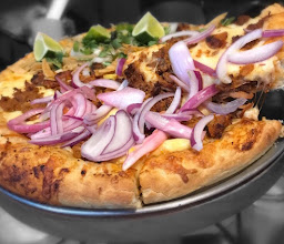 Pizza del Perro Negro Pedro Moreno photo