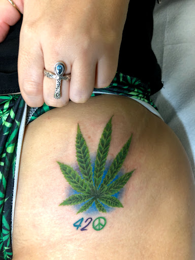 Explore tim burton tattoo sleeve ideas, creative tattoo ideas in Englewood, available at Point of Entry Tattoo