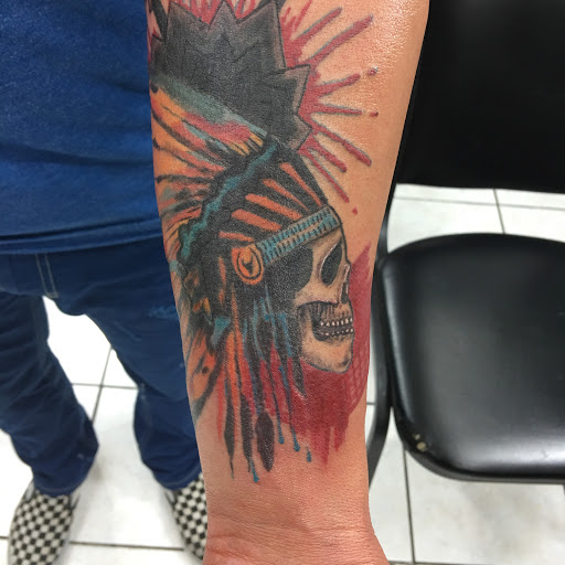 Explore side arm tattoo ideas, creative tattoo ideas in Kenner, available at Electric Expressions