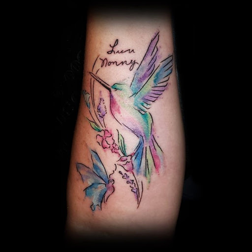 Tattoo Shop «Tit 4 Tat Tattoo Studio Inc.», reviews and photos, 45571 Mound Rd, Shelby Charter Township, MI 48317, USA