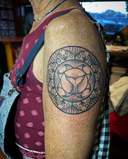 Explore thigh tattoo ideas for women, creative tattoo ideas in North Adams, available at Lucky Cat Tattoo