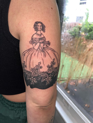 Explore women half sleeve tattoo ideas, creative tattoo ideas in Cocoa, available at Rorschach Tattoo Shop and Piercing Studio