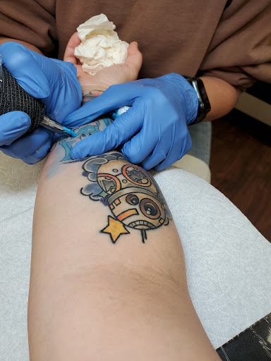 Explore son tattoo ideas, creative tattoo ideas in Ventura, available at White Lotus Body Arts Studio