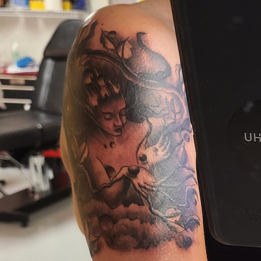 Explore psych tattoo ideas, creative tattoo ideas in Marietta, available at Monkeys Uncle Tattoo