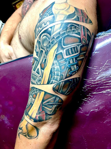 Explore back tattoo for women ideas, creative tattoo ideas in Warner Robins, available at Untold Pain Tattoo Studio