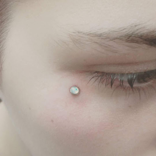 Explore tattoo ideas on side of stomach, creative tattoo ideas in Phenix City, available at Skin Traditions Tattoo Studio