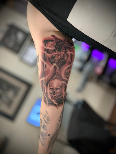 Explore fern tattoo ideas, creative tattoo ideas in Roscoe, available at Elevated Ink Tattoo