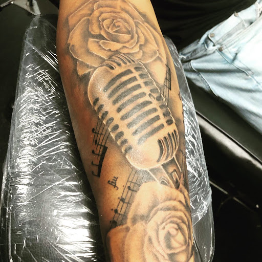 Explore chandelier tattoo ideas, creative tattoo ideas in Roxboro, available at Solo Ink Tattoo Shop Appointment Only