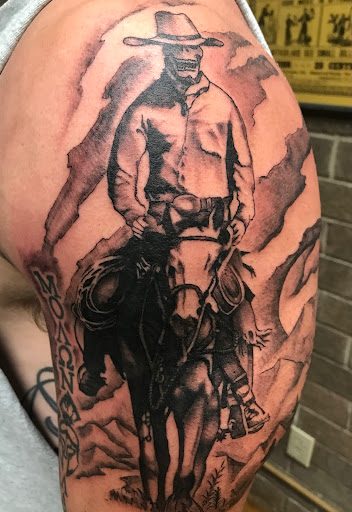 Explore cleavage tattoo ideas, creative tattoo ideas in High Point, available at 21 Aces Tattoo Co.