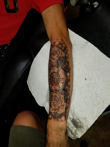 Explore tattoo ideas for two sons, creative tattoo ideas in Conway, available at Primal Urge Tattoos