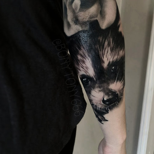 Explore top of foot tattoo ideas, creative tattoo ideas in Franklin, available at The Rue Morgue Tattoo Gallery