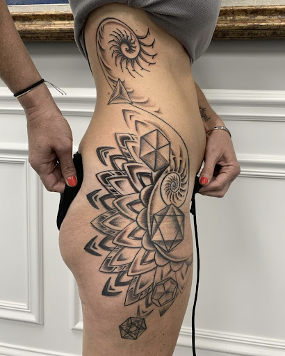 Explore flower tattoo ideas arm, creative tattoo ideas in Warrenville, available at UpRise Tattoos